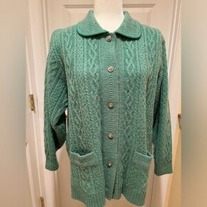 Vintage hand-knit wool green sweater with gorgeous buttons. Maybe Size L.